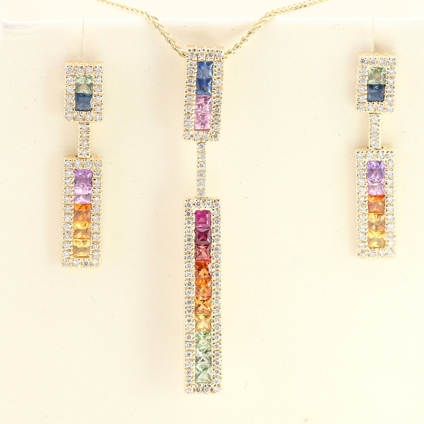 Multi-coloured sapphire and diamond set