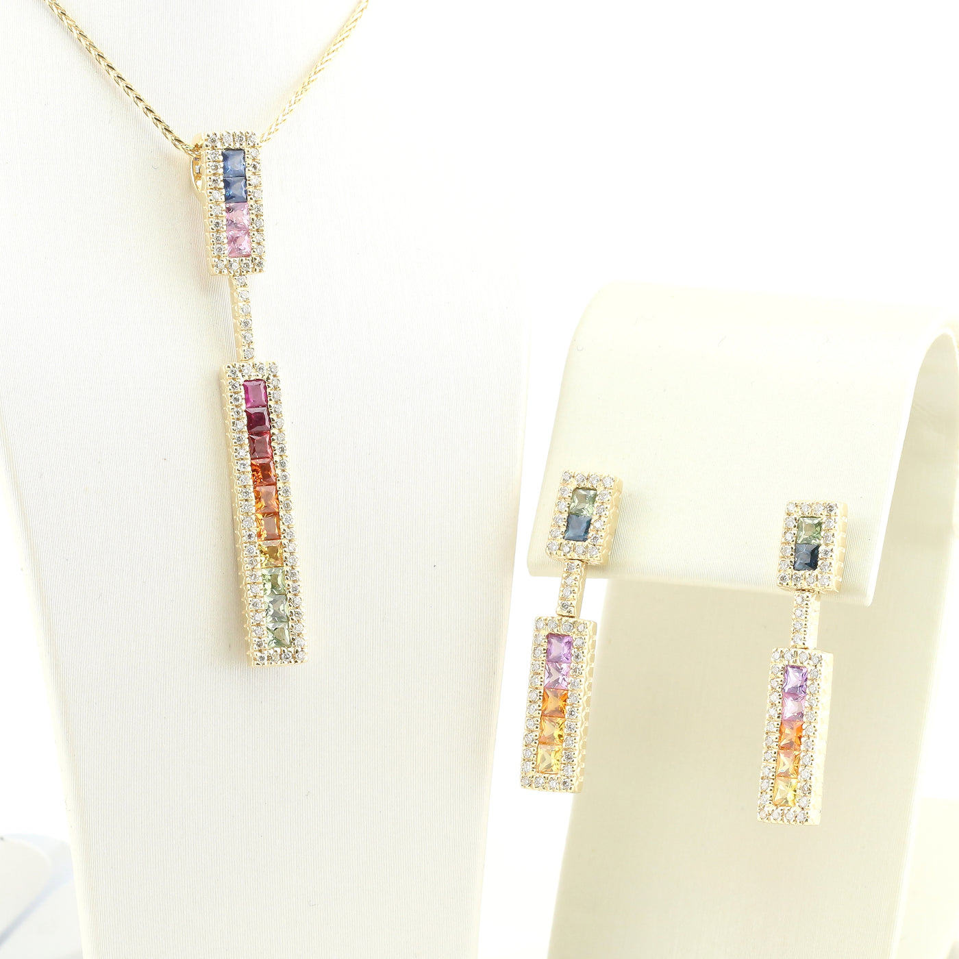 Multi-coloured sapphire and diamond set