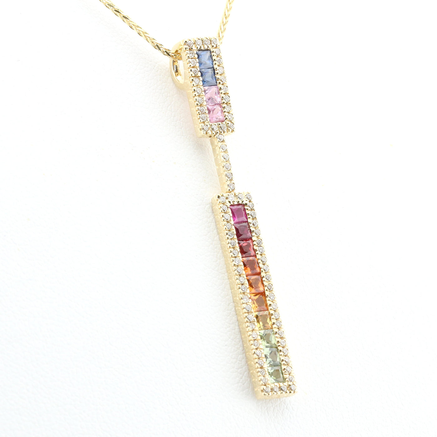 Multi-coloured sapphire and diamond set