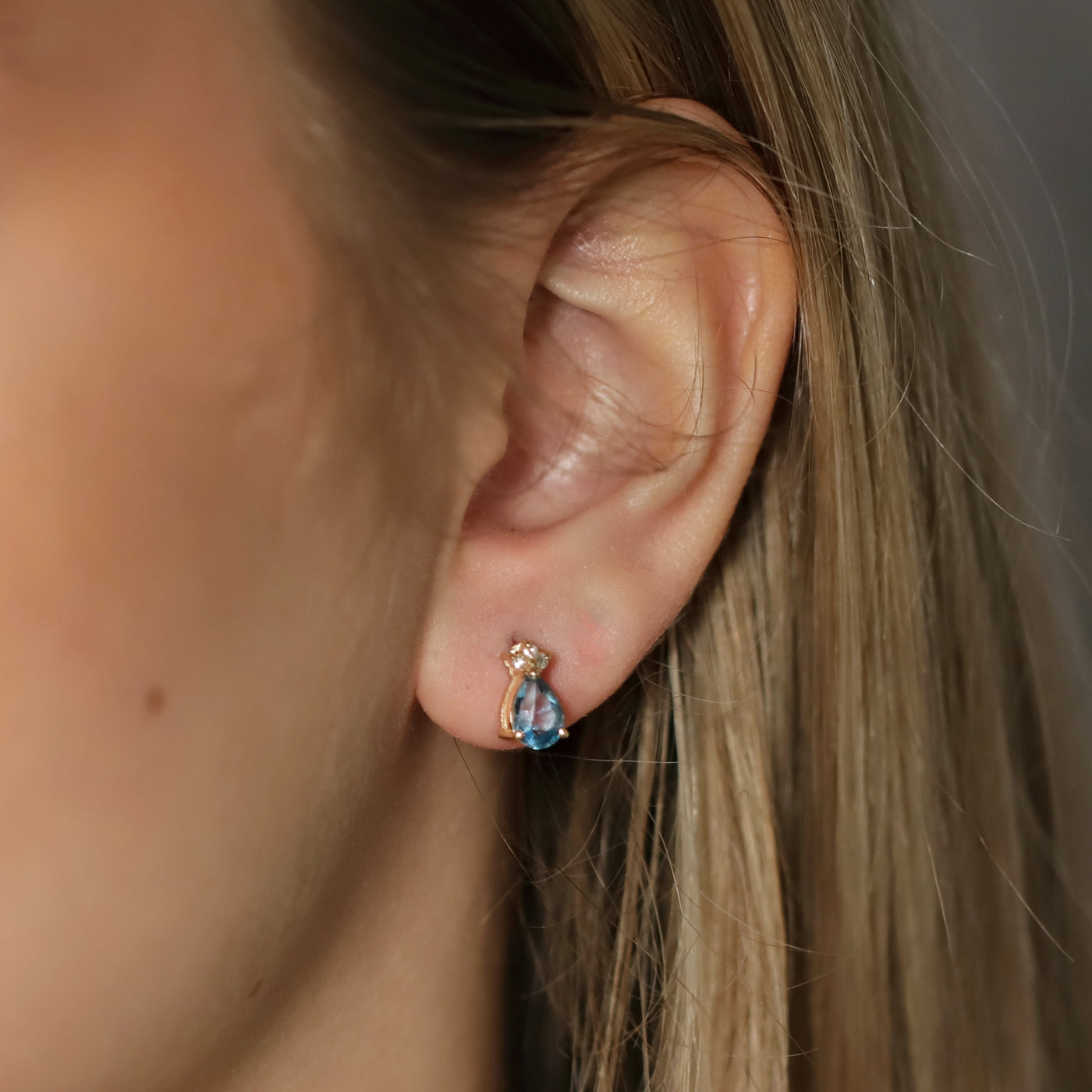 Blue topaz and diamond stud earring