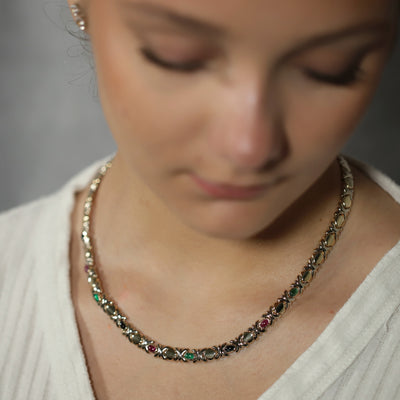 Collar style necklace with coloured stones