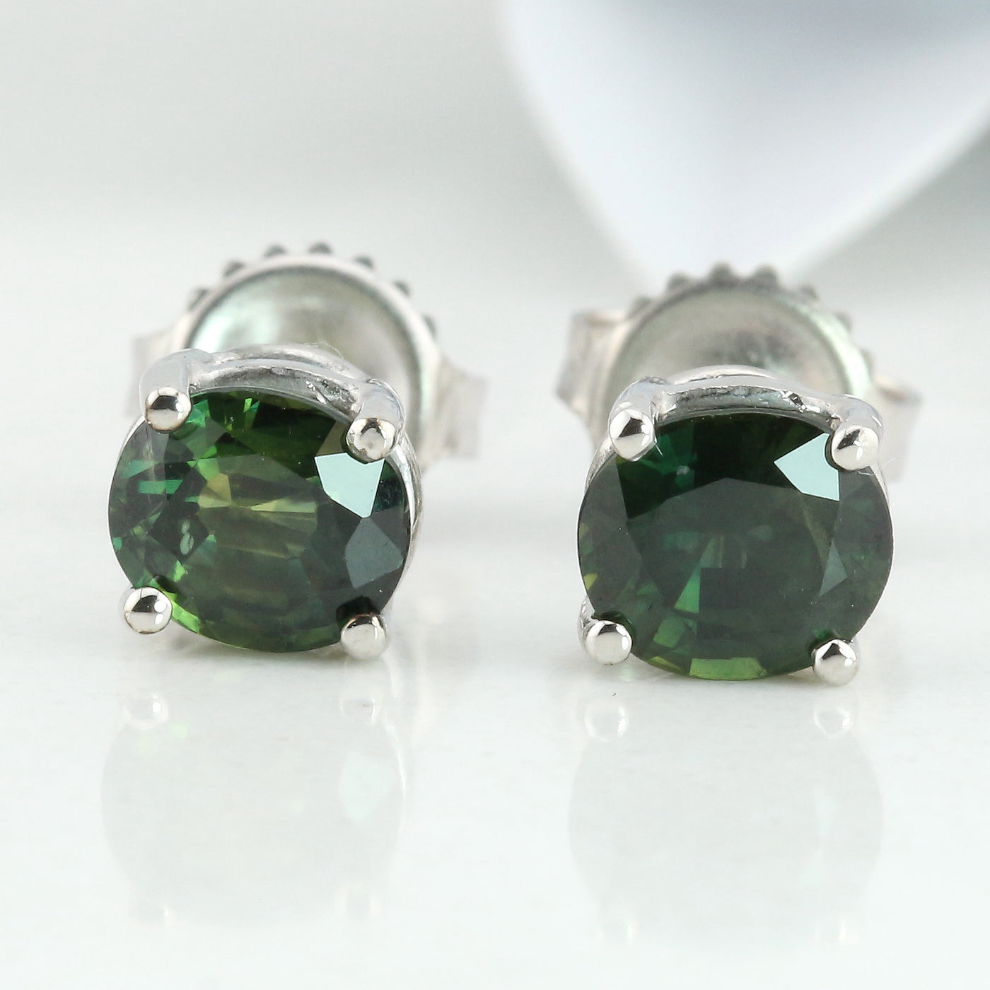 Green sapphire stud earrings