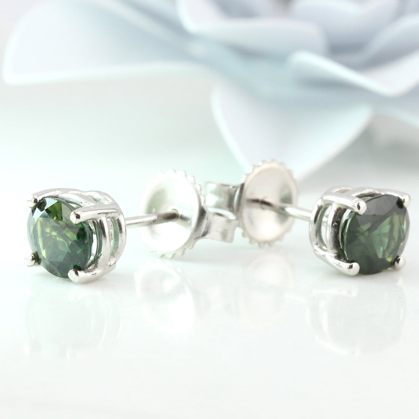 Green sapphire stud earrings