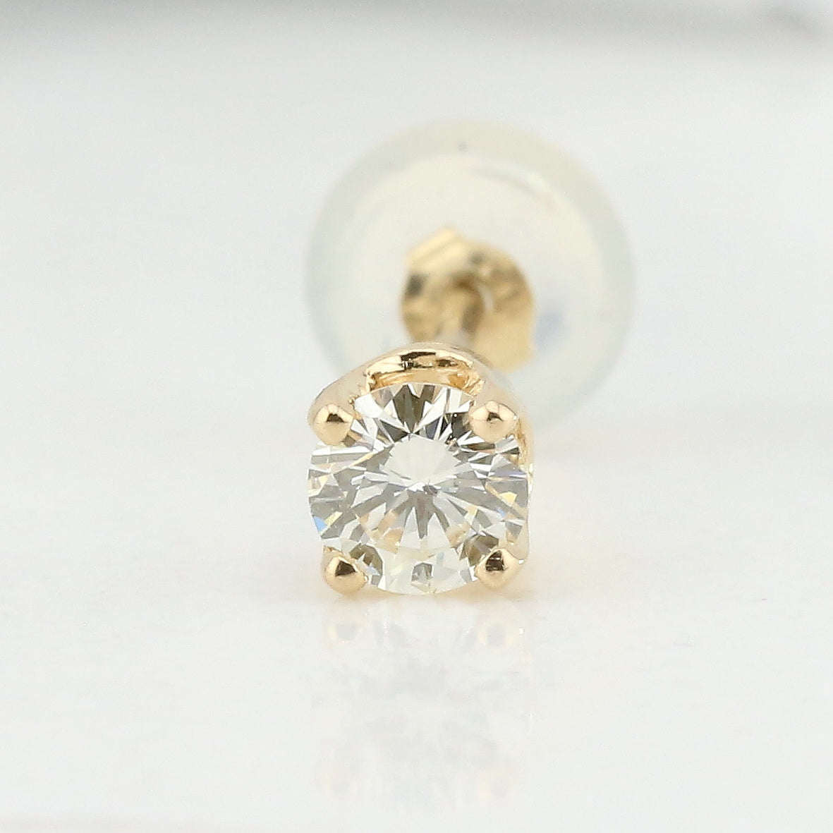 Single diamond stud earring