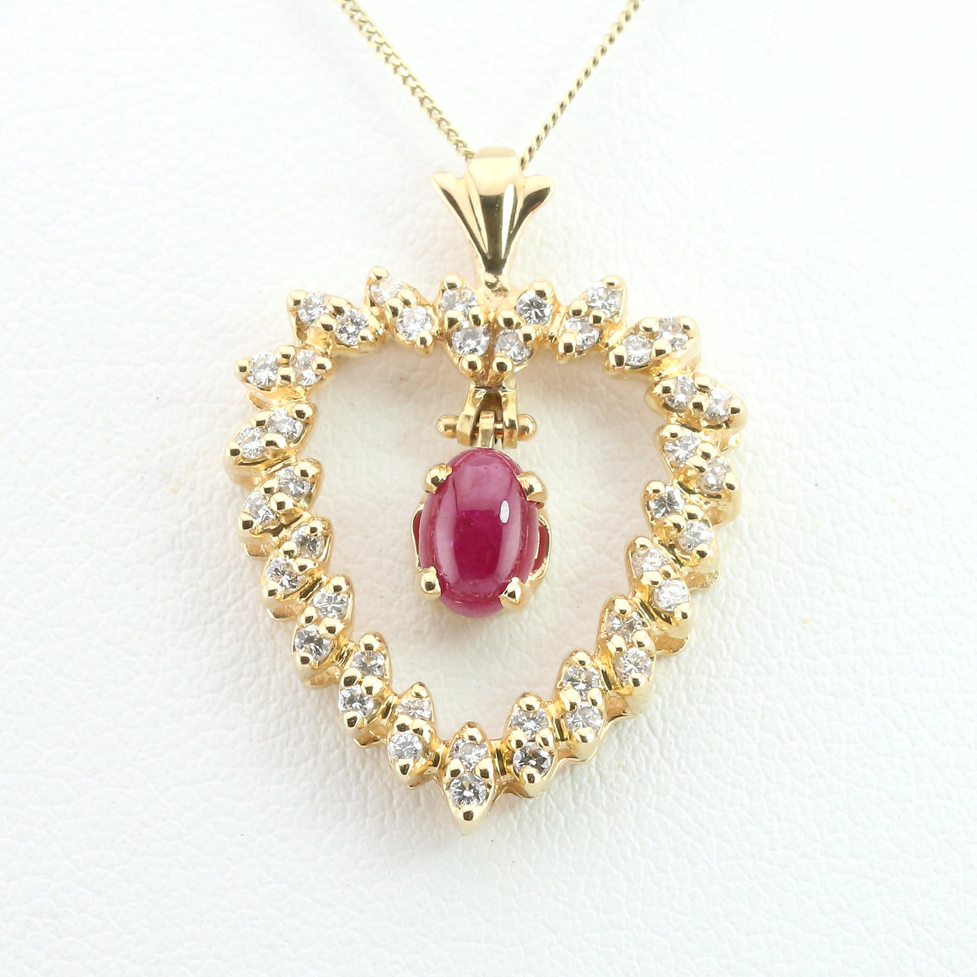 Ruby and diamond heart pendant