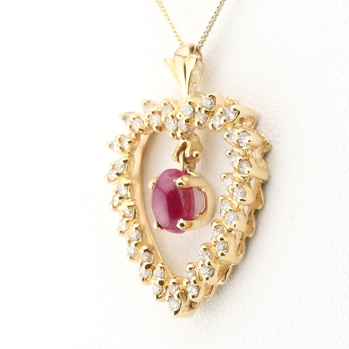 Ruby and diamond heart pendant