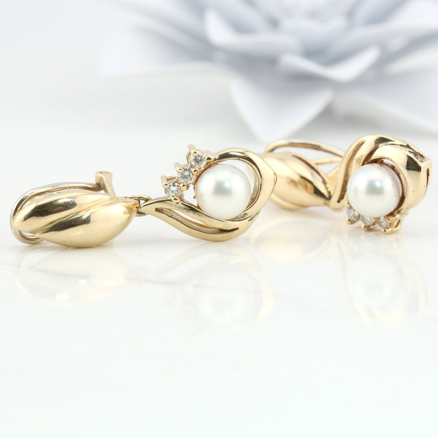 Pearl and diamond earrings