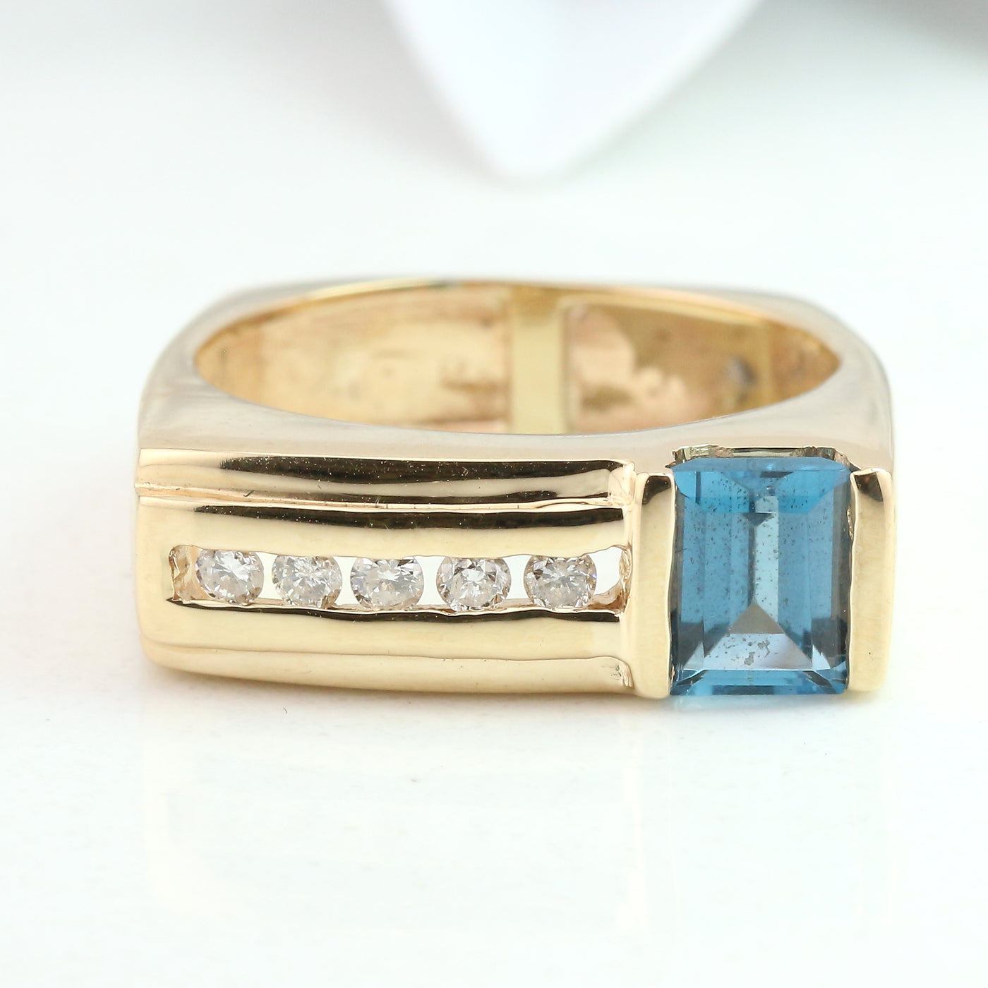 Blue topaz & diamond ring