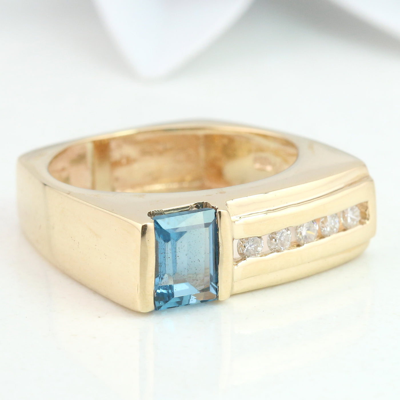 Blue topaz & diamond ring